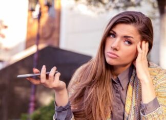 Teen rolling her eyes annoyed at parenting rules