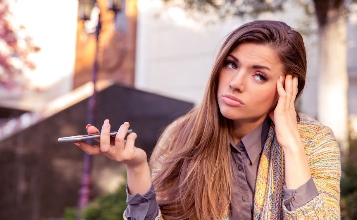 Teen rolling her eyes annoyed at parenting rules