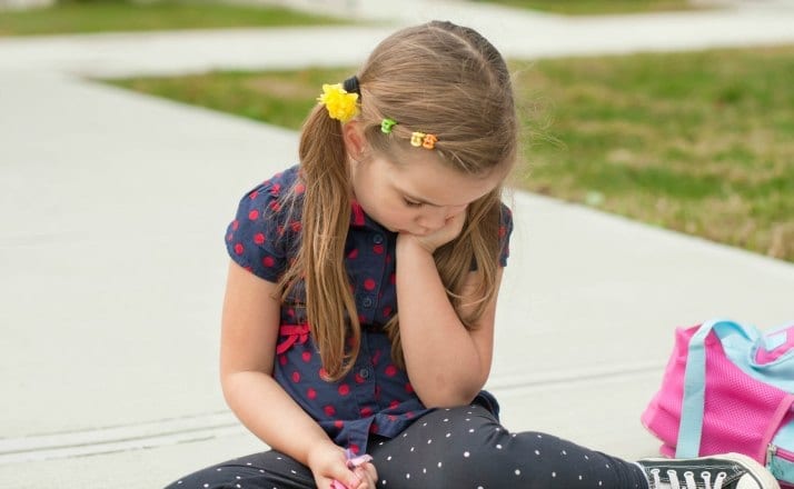 Back to school can be a hard transition for many kids. It can result in acting out, emotional overwhelm, and tantrums that are not typical for your child. Here's the best way to help your child deal with back to school meltdowns. #positiveparenting #motherhood #momlife #raisingkids #positiveparentingsolutions #emotionaloverwhelm #tantrums