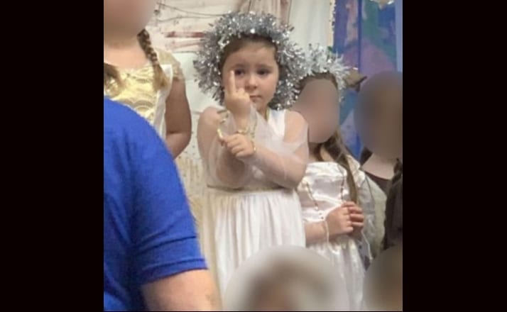 Little Girl Spreads Christmas "Cheer" After Unintentionally Giving The Audience The Finger During School Nativity