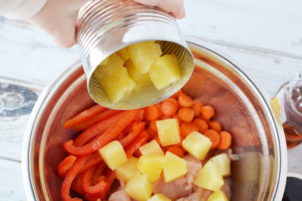 adding ingredients to create dish