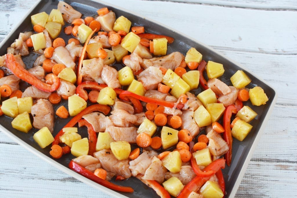 spreading out on sheet pan to put into the oven