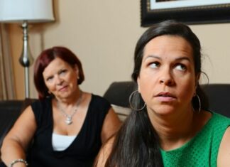 Woman rolling her eyes at older woman behind her giving her advice about depression