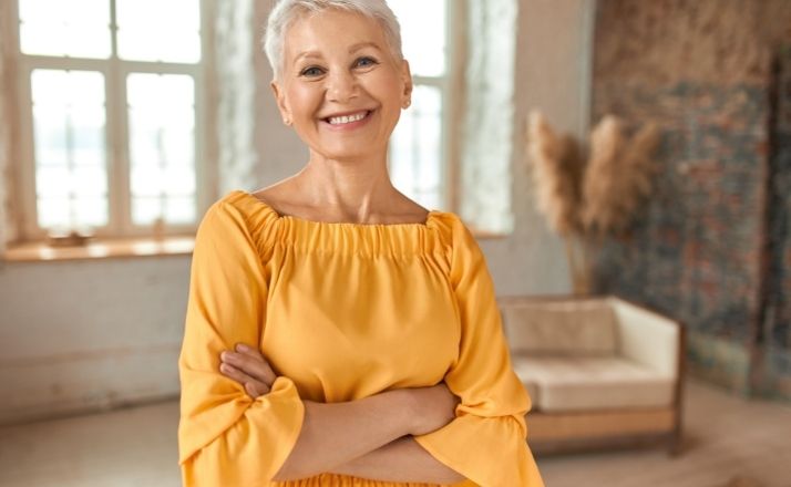 confident smiling woman now that kids are out of the house