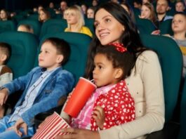 Mom and kids are movies while on a staycation