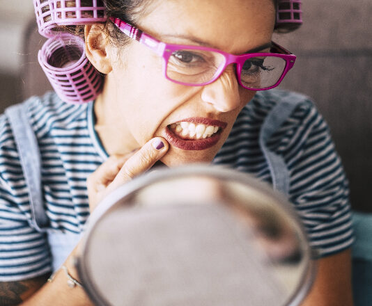 woman's lips in mirror