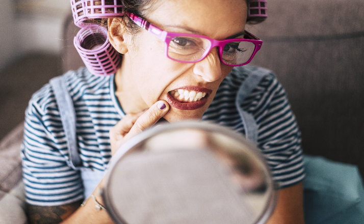 woman's lips in mirror