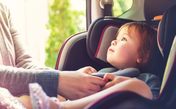 how long are car seats good mom buckling child in car seat