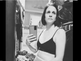 woman sitting in change room