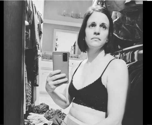 woman sitting in change room