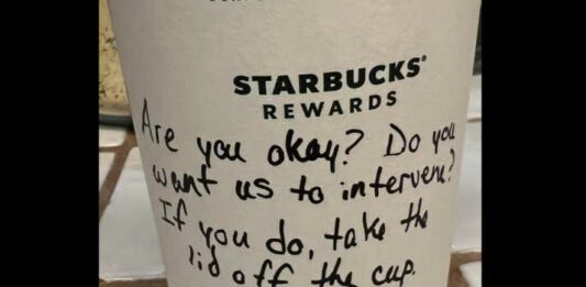 Starbucks cup with message on it