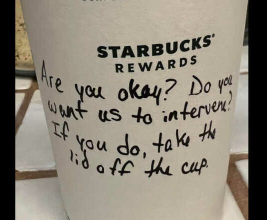 Starbucks cup with message on it