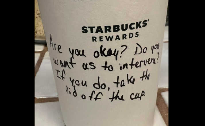 Starbucks cup with message on it