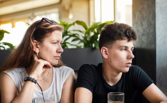 teenager rolling eyes at mom