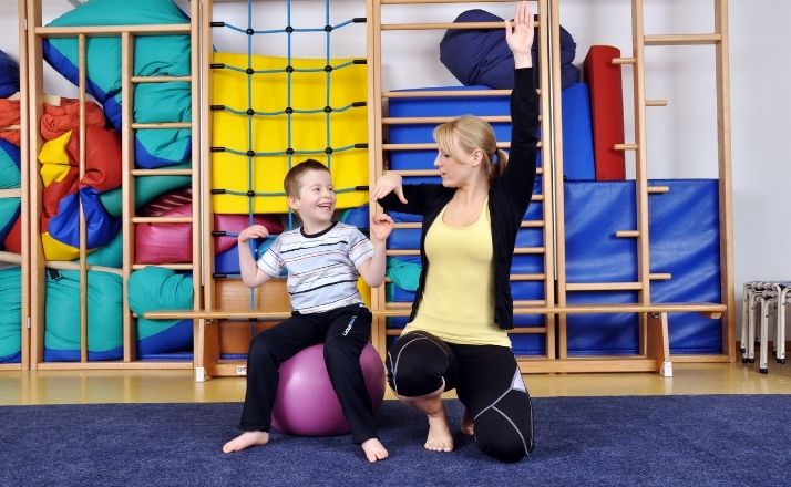 child and therapist doing occupational therapy