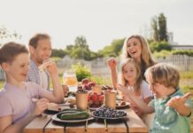 family laughing as they share trivia questions for kids