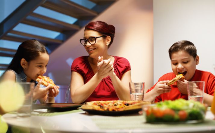 mom asking would you rather questions for kids around the dinner table