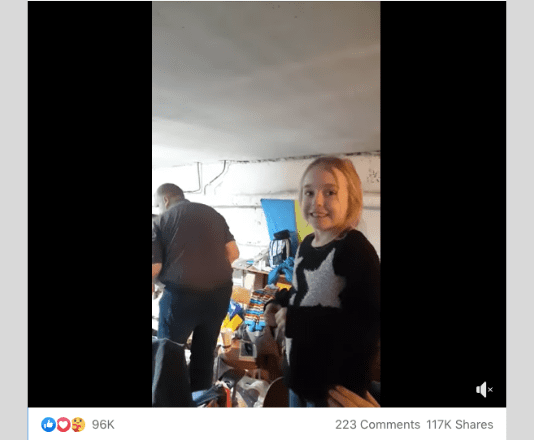Screenshot image of a young Ukrainian girl singing Let It Go while hiding in a bomb shelter.
