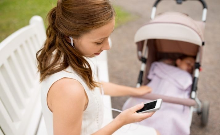 Mom listening to podcast as micro self-care