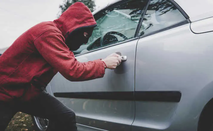 Car breaking by unknown male with hidden face carjackings are increasing