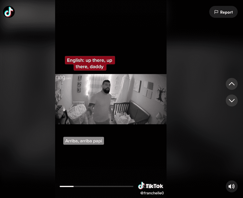 Screenshot of @franchelle TikTok video showing a father standing over his child's crib as they talk about the camera.