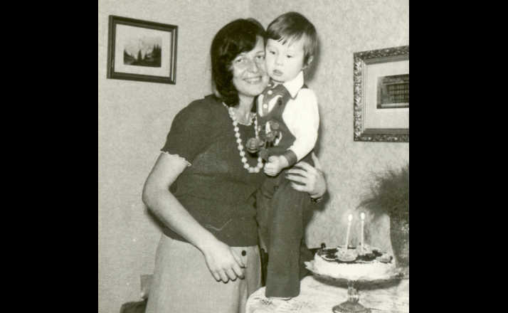 vintage 1975 mom and son standing in dining room