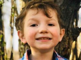 close up photo of six year old boy