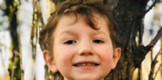close up photo of six year old boy
