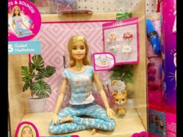 screenshot of photo of yoga barbie in box