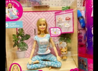 screenshot of photo of yoga barbie in box