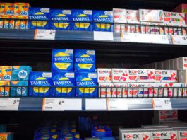 Minsk, Belarus. Mar 2022. Women`s hygiene products on shelf in supermarket. Feminine hygiene products in grocery store. Sanitary protection for women, sanitary napkins and tampons