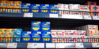 Minsk, Belarus. Mar 2022. Women`s hygiene products on shelf in supermarket. Feminine hygiene products in grocery store. Sanitary protection for women, sanitary napkins and tampons