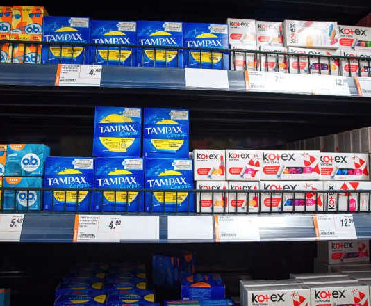 Minsk, Belarus. Mar 2022. Women`s hygiene products on shelf in supermarket. Feminine hygiene products in grocery store. Sanitary protection for women, sanitary napkins and tampons