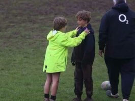 two young rugby players having a talk