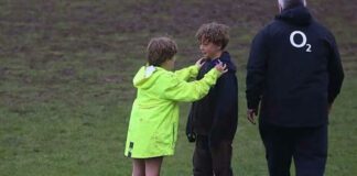 two young rugby players having a talk