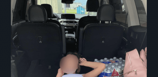 photo of tween girl in back of car