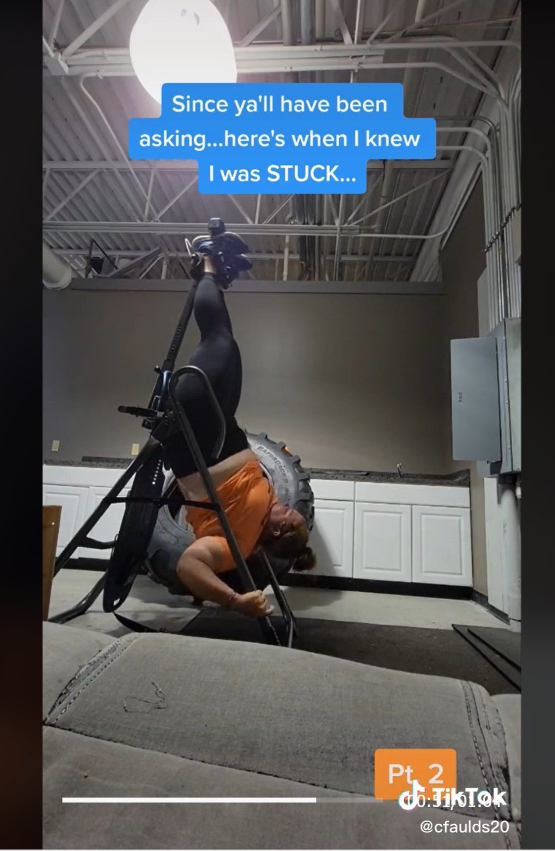 woman stuck on inversion table