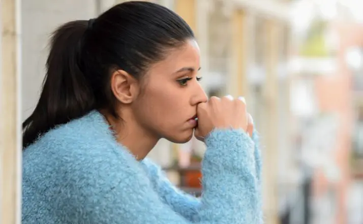 woman grieving after ending a toxic relationship with her parents